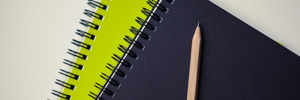 Blocco note con penne